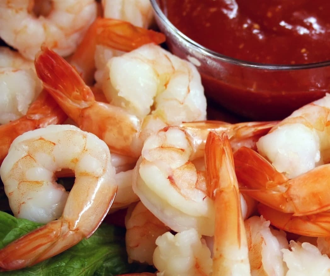 Fresh cooked shrimp with cocktail sauce