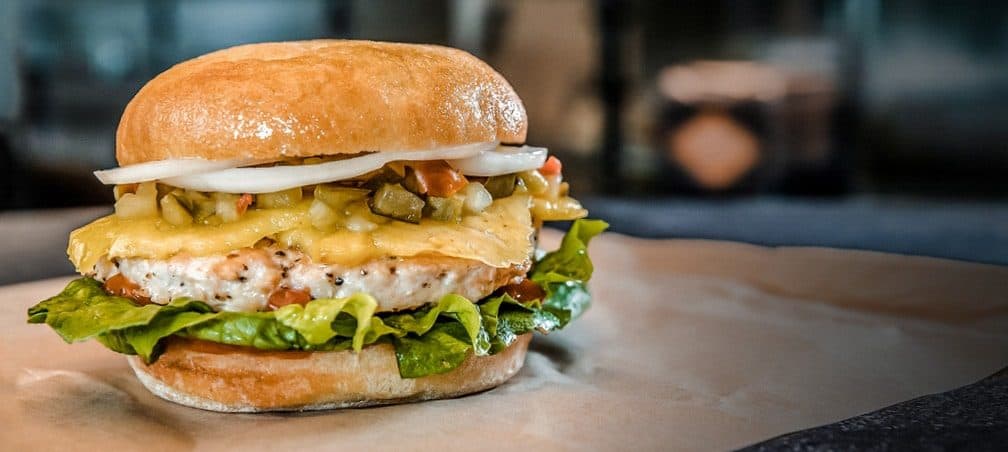Grilled chicken burger with pineapple and relish